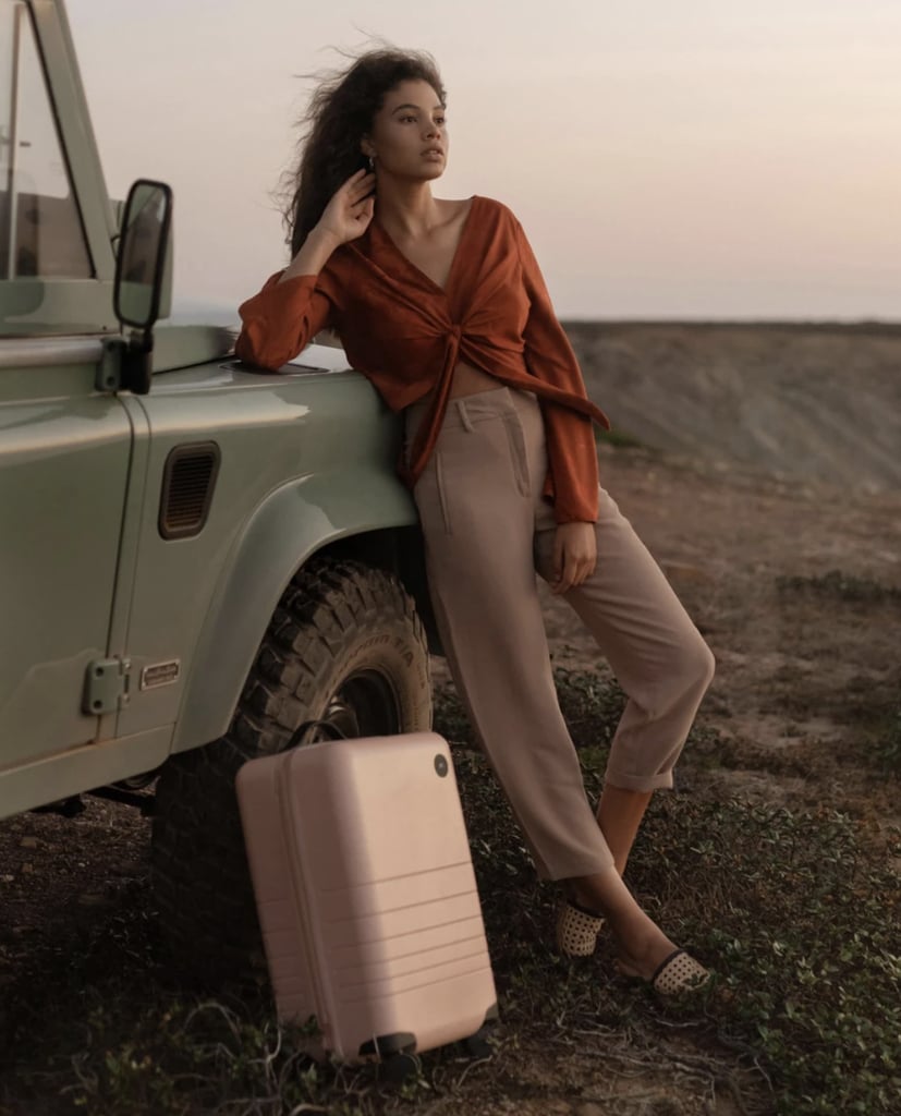 A Stylish Suitcase With Compartments: Monos Carry-On Suitcase