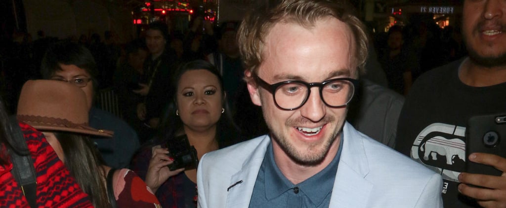 Tom Felton Holding Rose at Beauty and the Beast Premiere