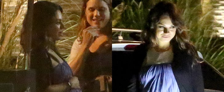 Mila Kunis Touches Her Baby Bump | Pictures