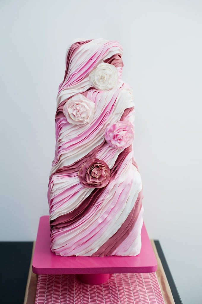 Can we all agree this is one phenomenal cake? All the marvelous layers of different shades of pink are having us do double takes. 
Photo by Rachel Peters Photography via Style Me Pretty