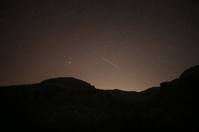 A Leonid meteor shower streaked across the dark night sky over Ankara, Turkey, in November 2020. The meteor shower in November will peak around the 18th of the month this year.