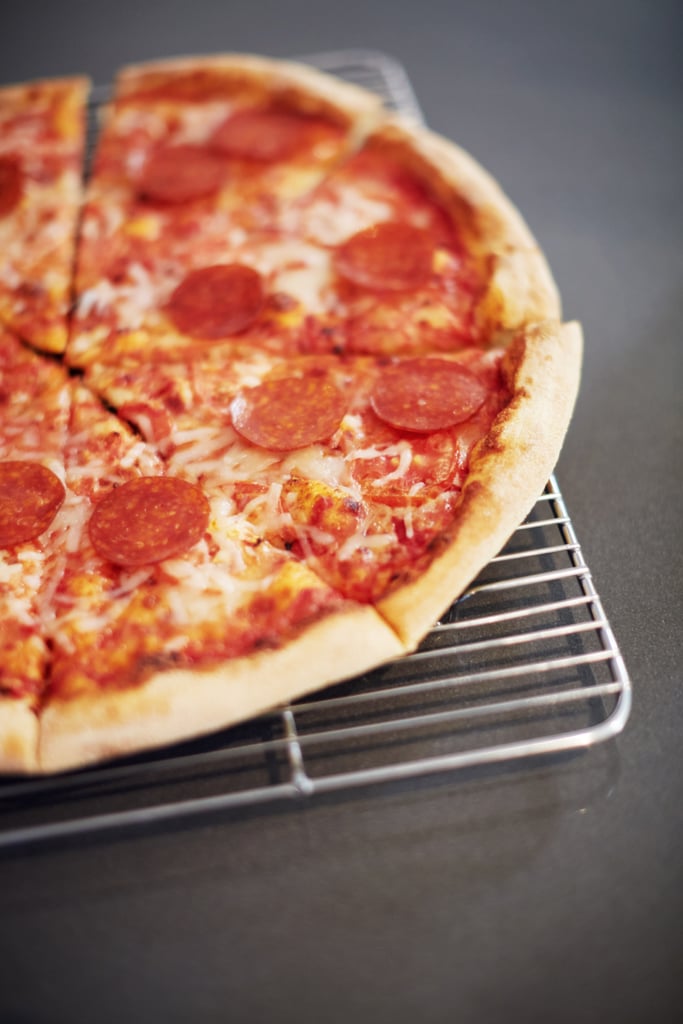 Make homemade pizzas and have an in-home game night.