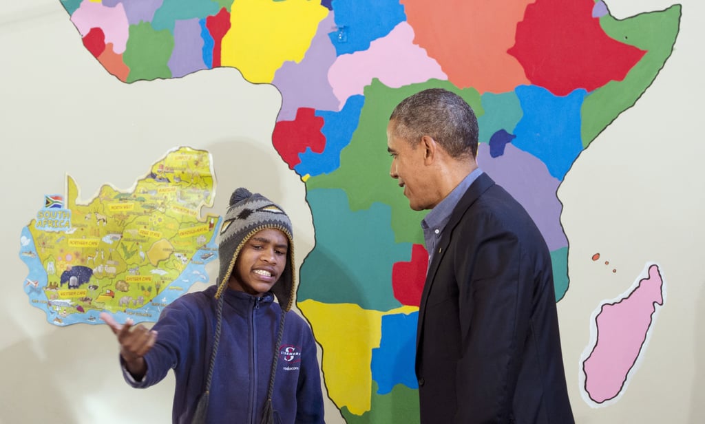 In June 2013, President Obama watched as a young boy rapped for him during a tour of the Desmond Tutu HIV Foundation Youth Center in Cape Town, South Africa.
