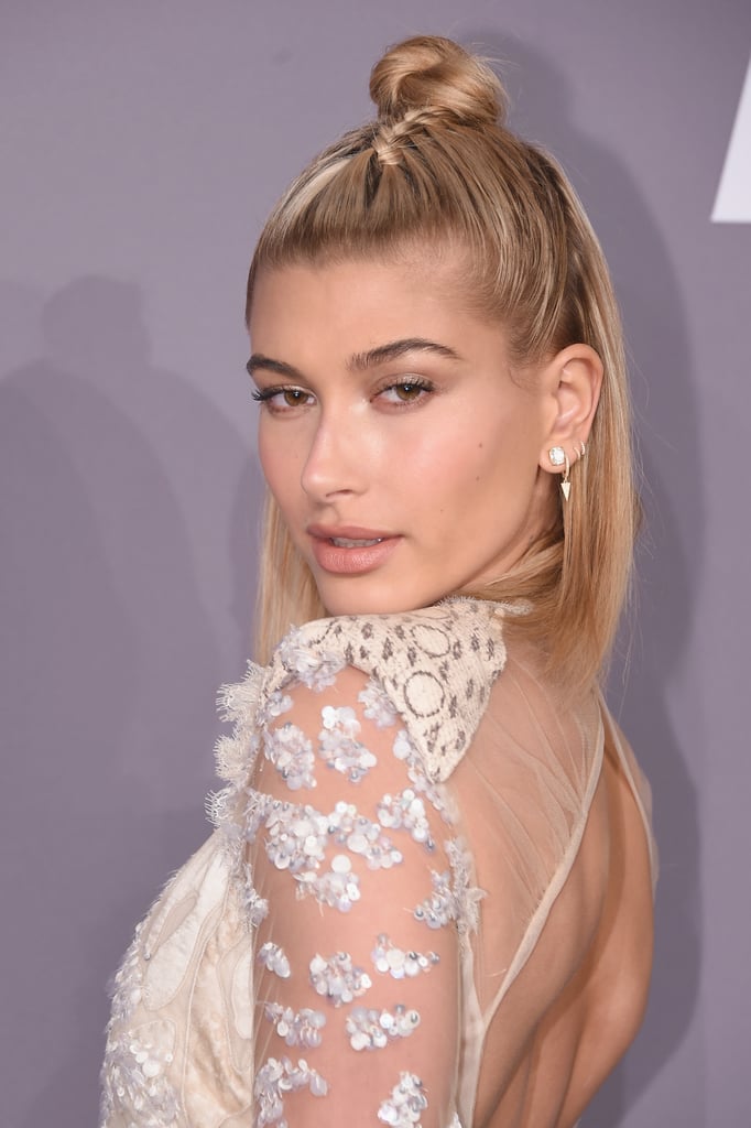 Hailey Baldwin's Braided Top Knot in February 2018