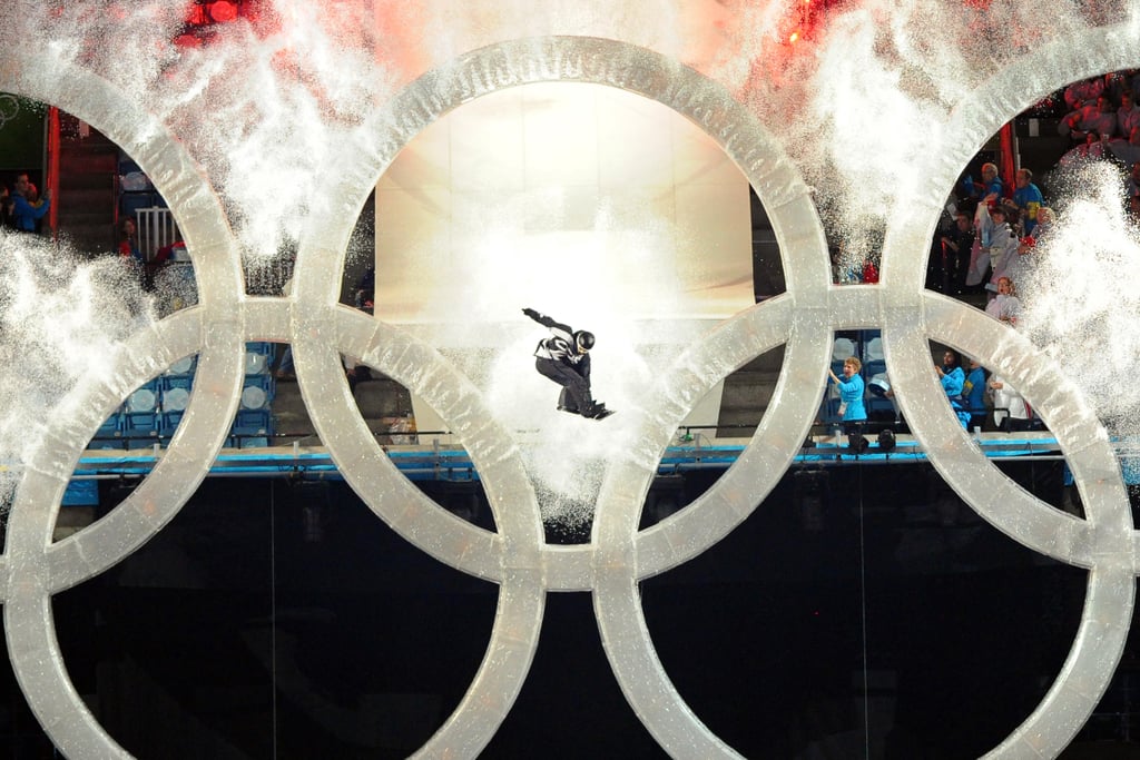 Then a snowboarder LEAPED through the Olympic rings.