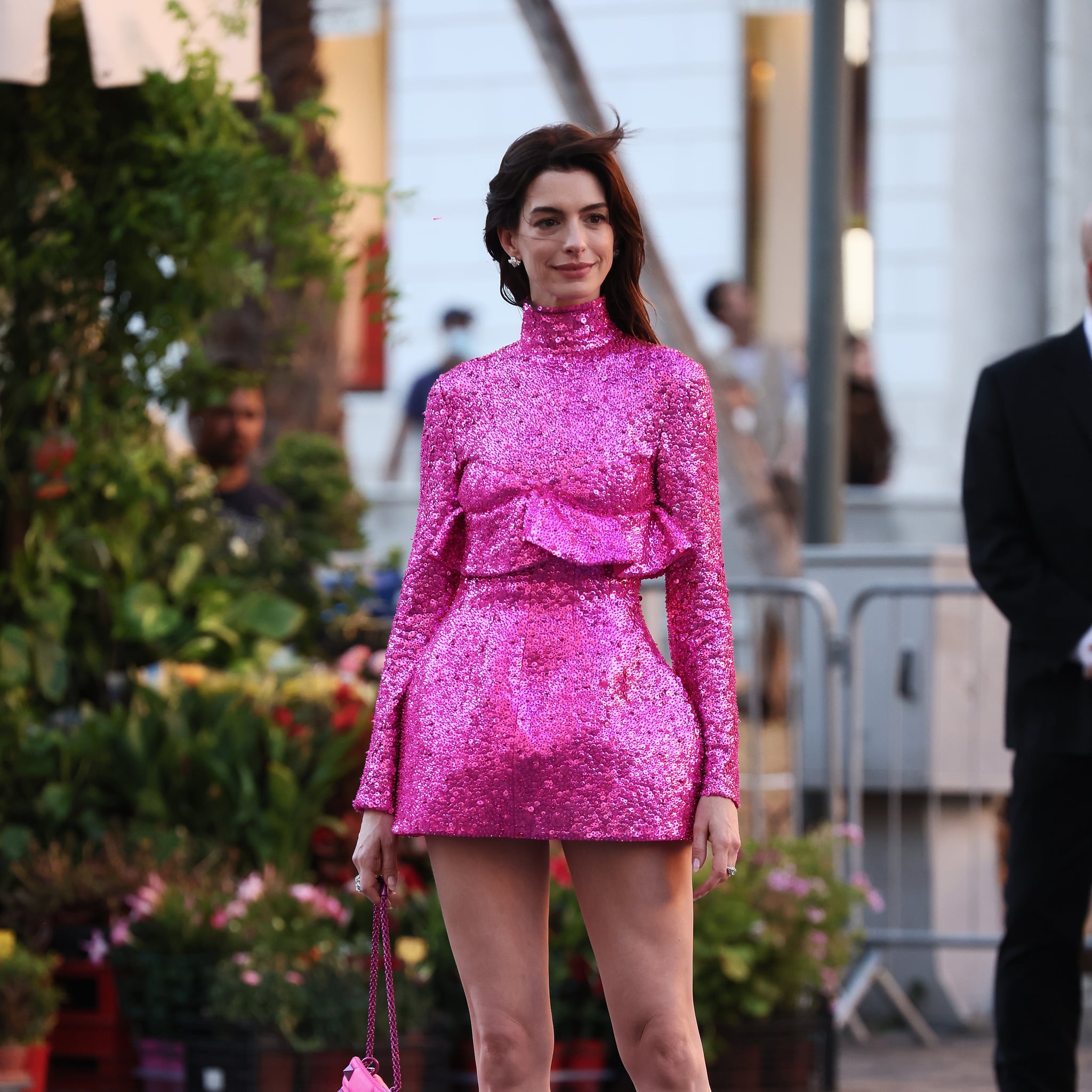 Anne Hathaway Wears a Barbie Pink Mini Dress at Valentino's Haute