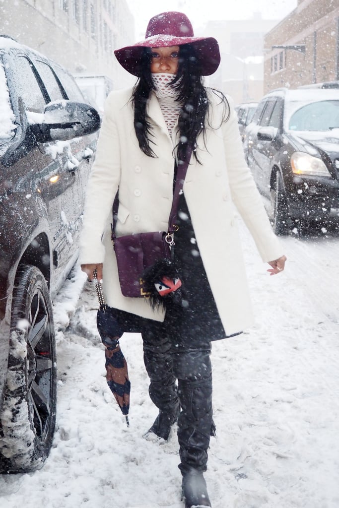 You're blizzard ready with a wide-brim hat and a Winter-white coat.