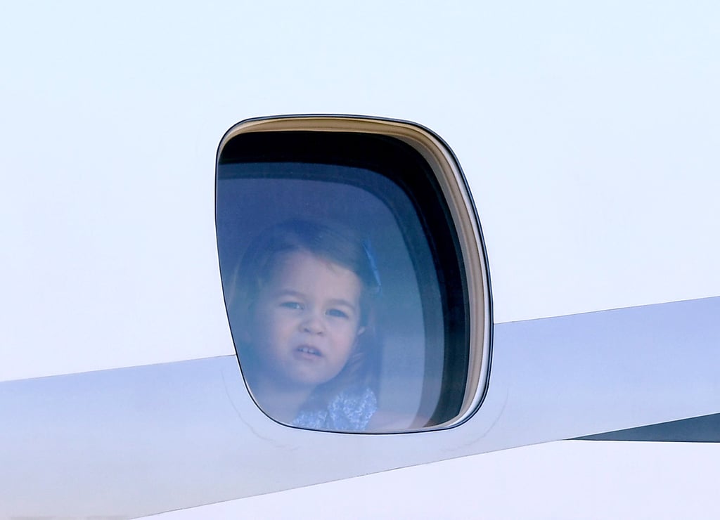 George and Charlotte Looking Out of Plane Windows Pictures