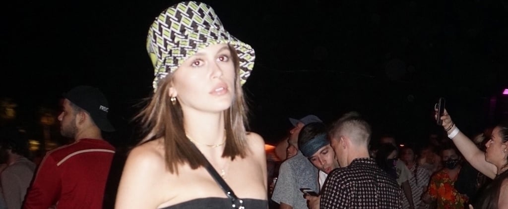 Kaia Gerber Jeans and Tube Top With Bucket Hat at Coachella