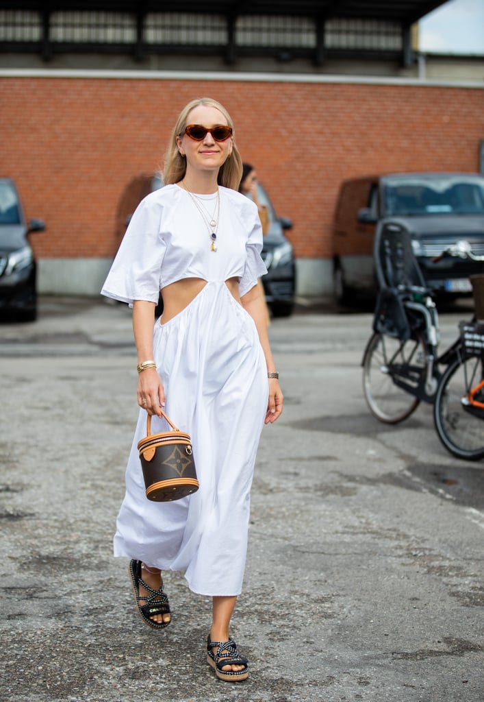 Pair your maxi white dress with sandals and a statement bag. How to