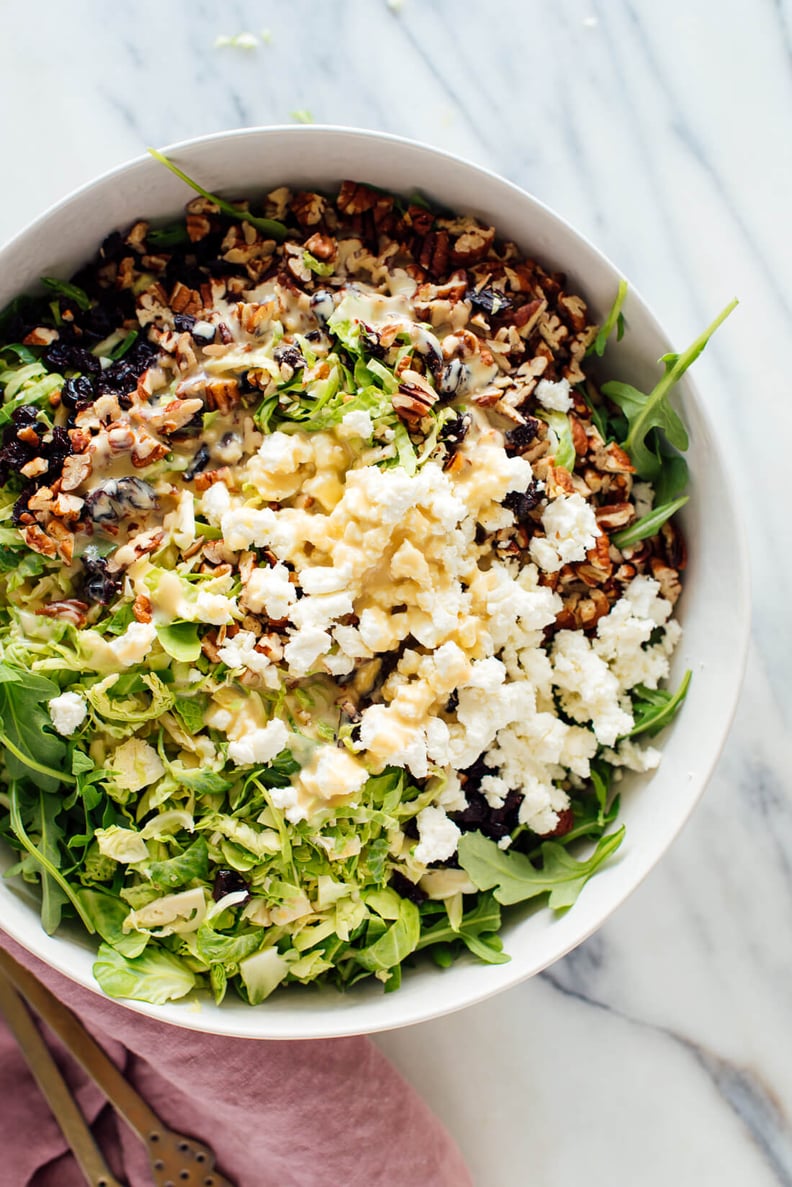 Shredded Brussels Sprouts and Arugula Salad With Sunshine Dressing