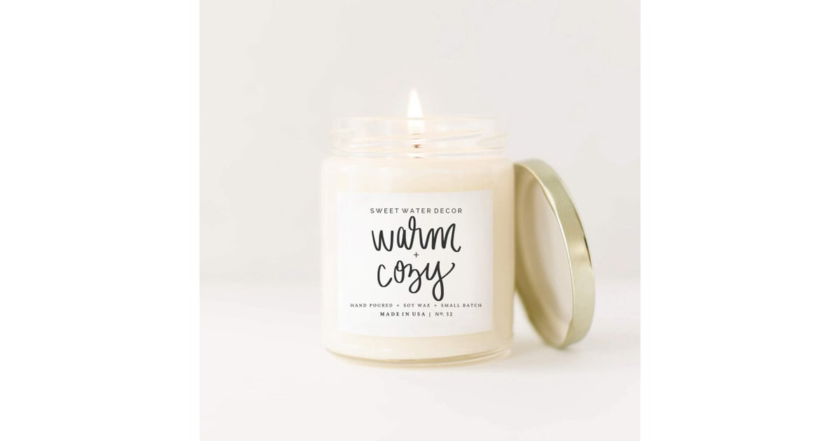 Sweet Water Decor Warm and Cosy Candle The Best Cosy Products You Can