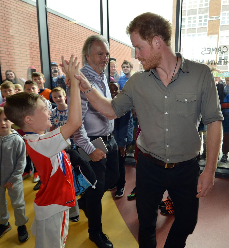 Prince Harry Visits Kids in England July 2016