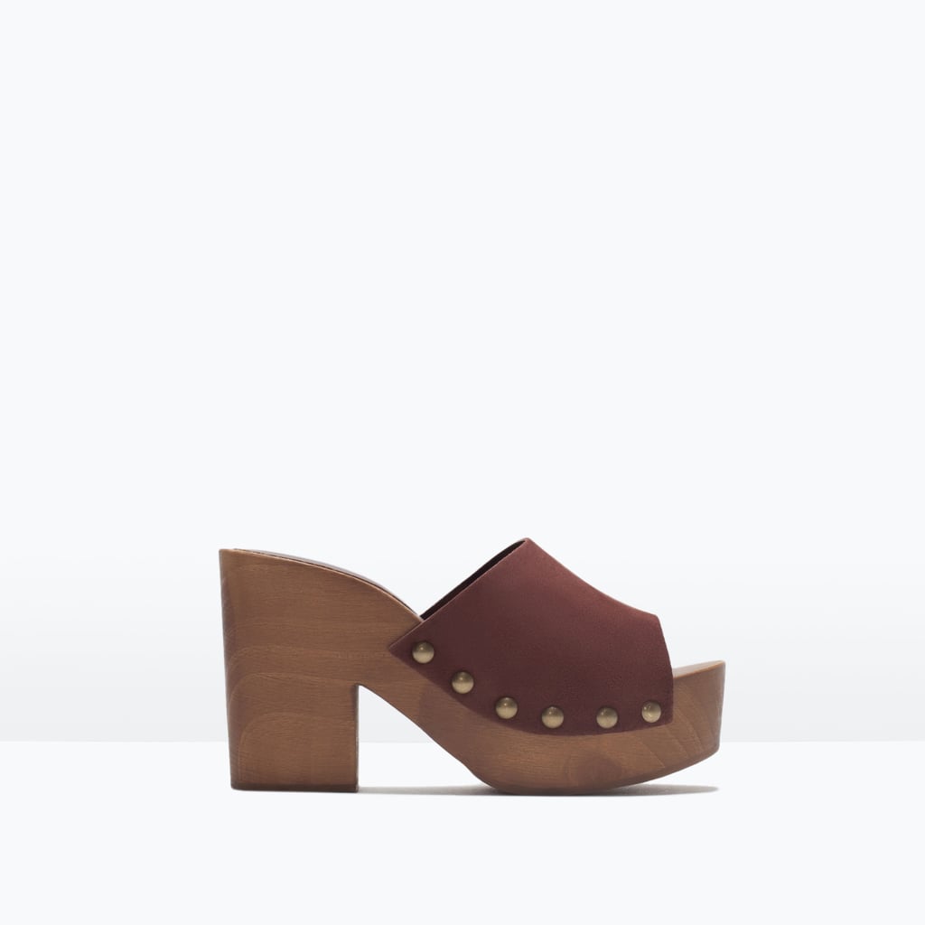 Leather studded clogs ($100)