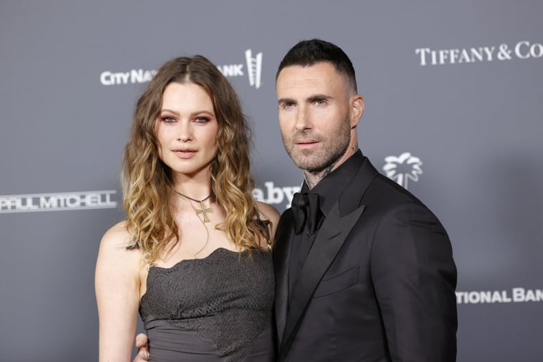 WEST HOLLYWOOD, CALIFORNIA - NOVEMBER 13: (L-R) Behati Prinsloo and Adam Levine attend the Baby2Baby 10-Year Gala presented by Paul Mitchell on November 13, 2021 in West Hollywood, California. (Photo by Amy Sussman/Getty Images for Baby2Baby)