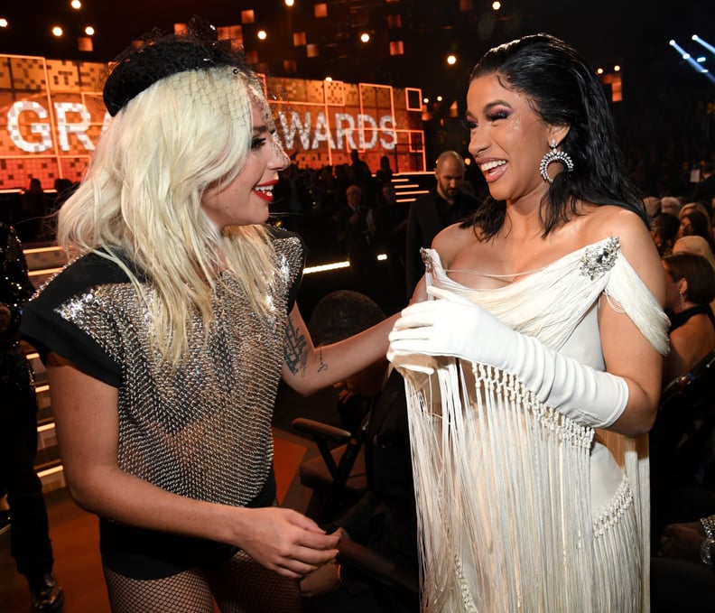LOS ANGELES, CA - FEBRUARY 10:  Lady Gaga (L) and Cardi B during the 61st Annual GRAMMY Awards at Staples Center on February 10, 2019 in Los Angeles, California.  (Photo by Kevin Mazur/Getty Images for The Recording Academy)