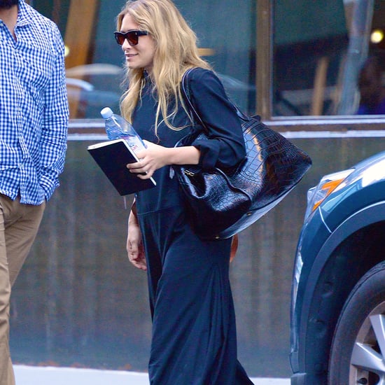 Ashley Olsen in Black Flip-Flops and Maxi Dress July 2018
