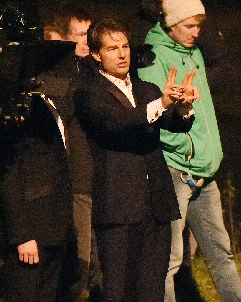 Tom Cruise suited up to film scenes for Mission: Impossible 5 in London on Monday.