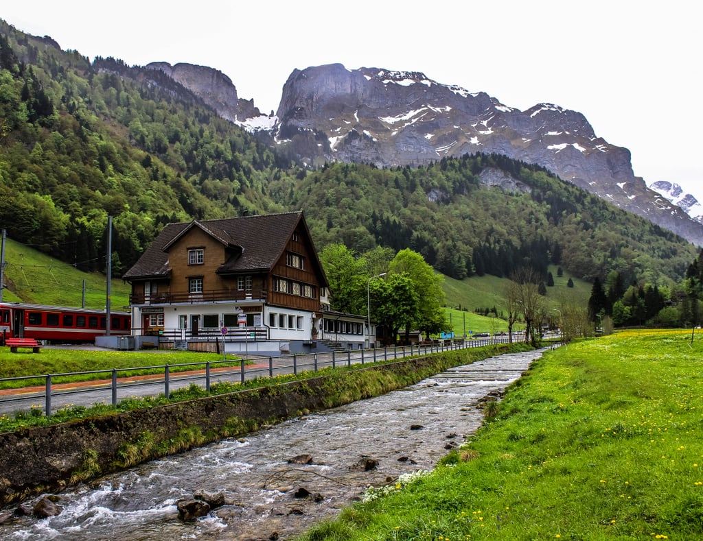 The only way to access the cliffside restaurant is by way of an aerial cable car located in the valley of Wasserauen, Switzerland. Once you climb on board, get ready to quickly fly high into the sky, soaring above one of the most idyllic areas in all of the Swiss Alps.