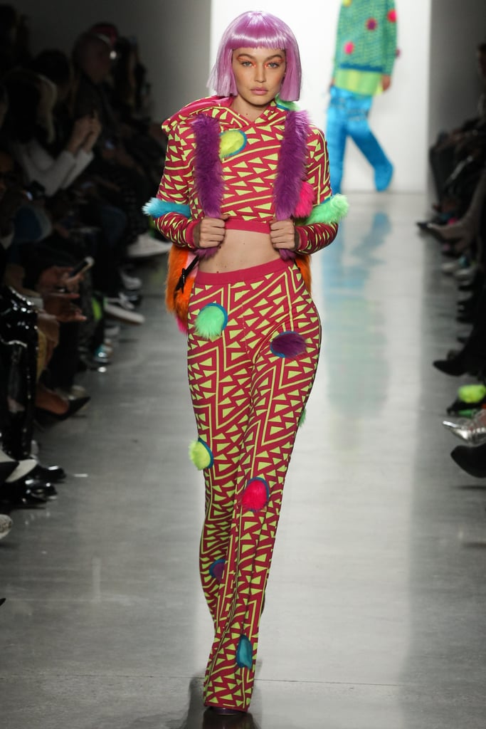 Are those pom-poms we see? Gigi rocked this eye-popping, funky ensemble down the runway.