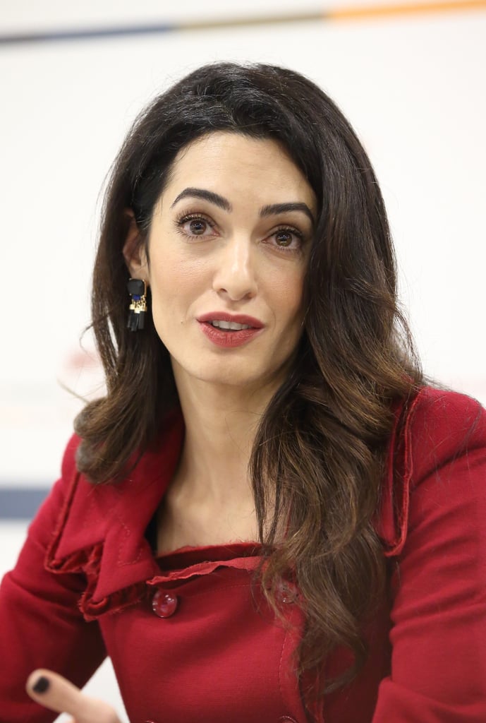 Amal Clooney Wearing a Red Suit