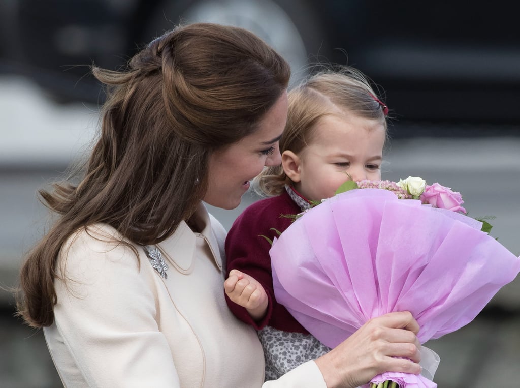 Kate let Charlotte smell her bouquet during their 2016 tour of Canada.