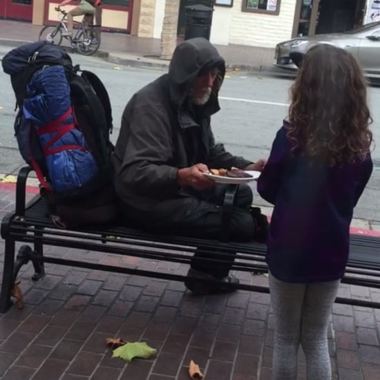 Little Girl Gives Meal to Homeless Man