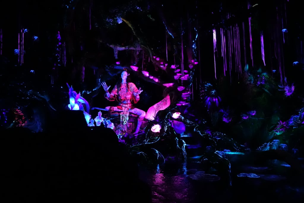 Next, I dashed over to ride Pandora's second ride, Na'vi River Journey. It's definitely more tame — picture Pirates of the Caribbean in a lush bioluminescent rainforest — but culminates with an up-close look at a Shaman of Songs, who gives good scale as to how large the Na'vi really are.