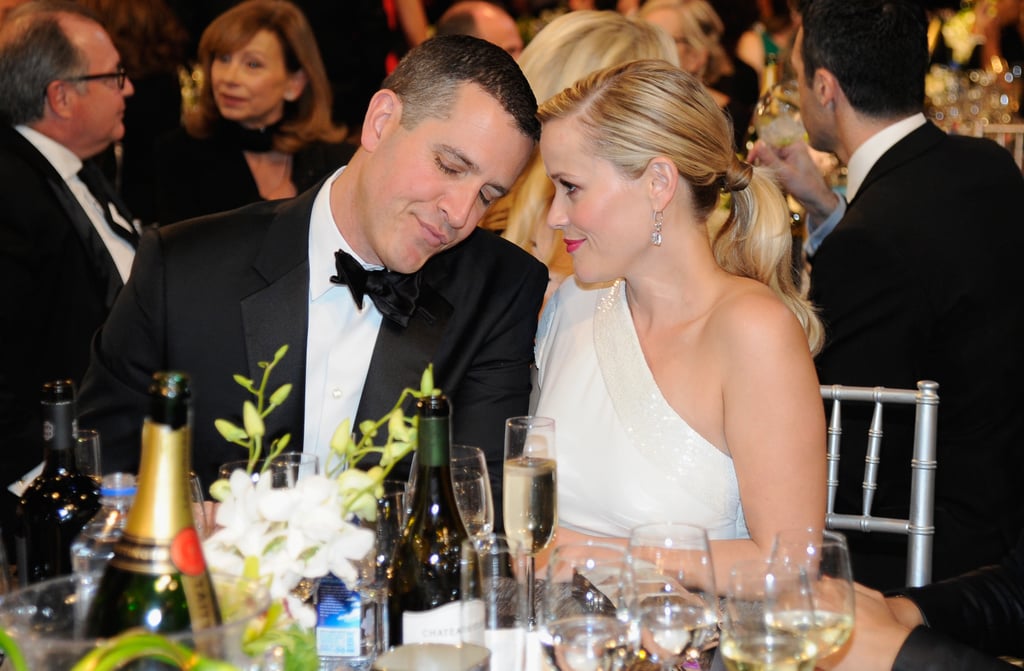 Reese Witherspoon and her husband, Jim Toth, shared a sweet moment at their table.