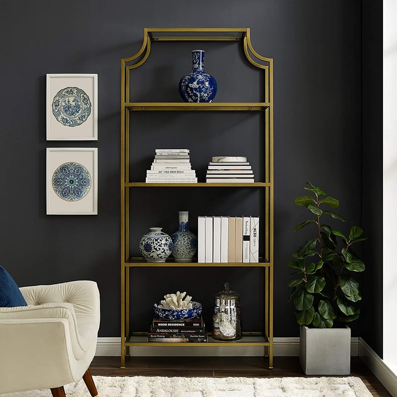 An Antique-Looking Bookcase: Bookcase With Gold Finish Open Shelving