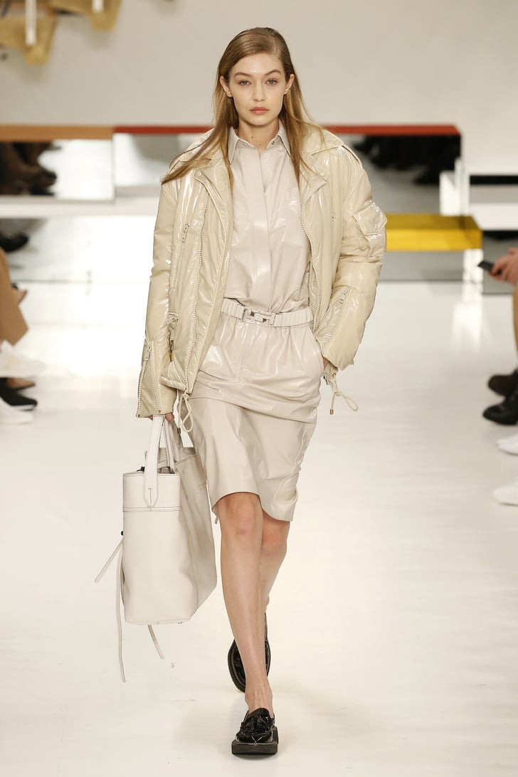 Gigi wore a beige jumpsuit at the Tod's show. Gigi Hadid at Fashion