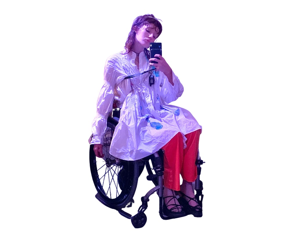 "Here I'm wearing a shirt I drew on for a performance where I lifted myself up with my wheelchair truck lift and sang System of a Down's "Toxicity". The pants are thrifted pleather with Eckhaus Latta socks."
