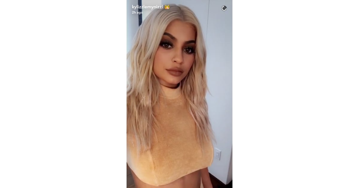 While Kylie Snapped Her Revealing Top Kardashian Jenner Outfits At