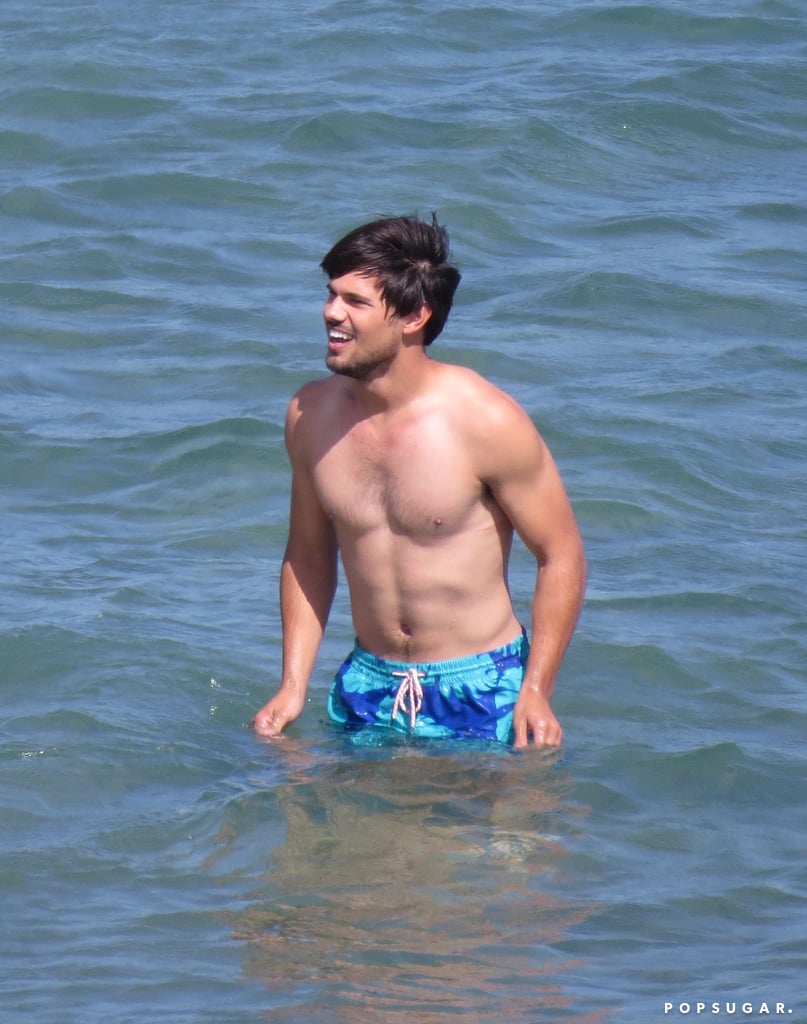 Taylor Lautner splashed around shirtless on the LA set of Run the Tide on Tuesday.