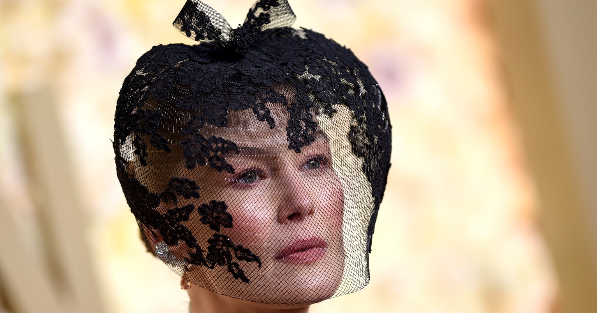 The Real Reason Behind Rosamund Pike's Veil at the Golden Globes