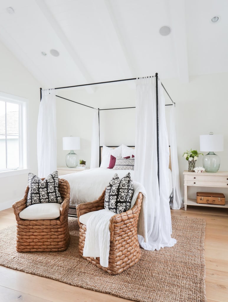 A cool and relaxing master bedroom creates the perfect retreat, but wait until you see the master bathroom. The Blue Tumbled Limestone flooring is beautifully paired with honed Carrara Marble. This modern farmhouse resides in Newport Heights, California. Home built by Graystone Custom Builders.