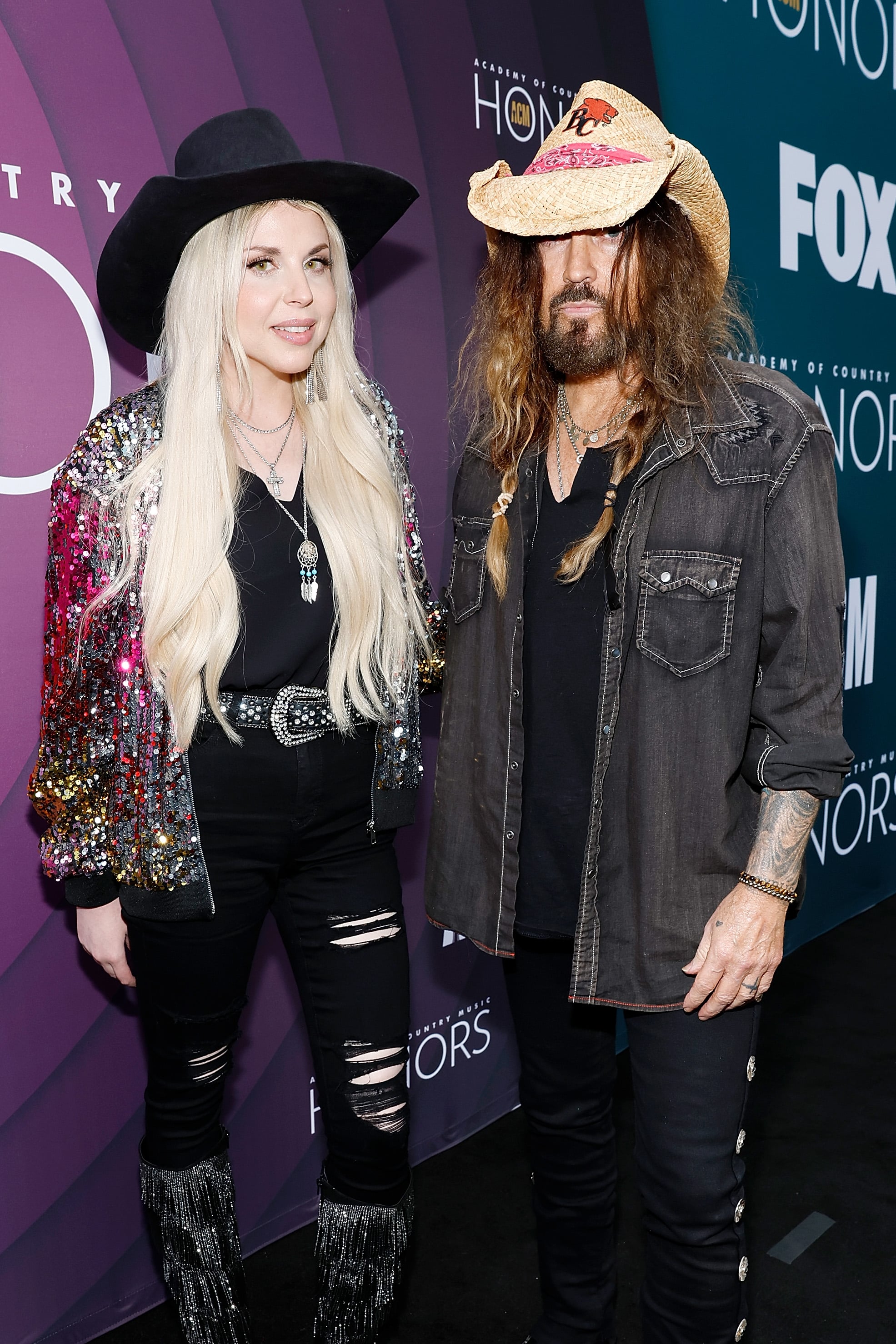 NASHVILLE, TENNESSEE - AUGUST 23: (L-R) FIREROSE and Billy Ray Cyrus attend the 16th Annual Academy of Country Music Honours at Ryman Auditorium on August 23, 2023 in Nashville, Tennessee. (Photo by Jason Kempin/Getty Images for ACM)