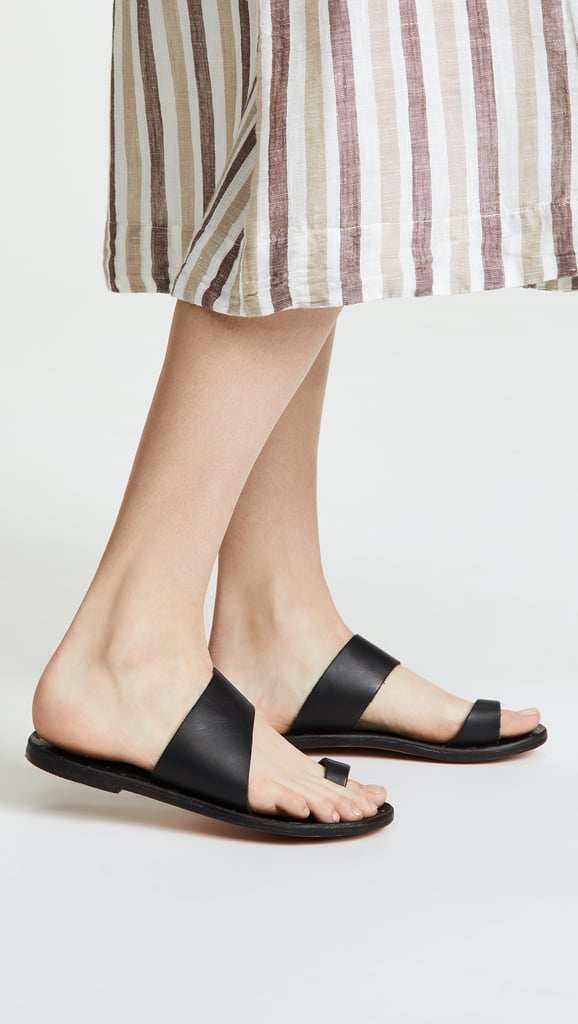 Beek Finch Toe Ring Slides | Jennifer Aniston Black Sandals With Toe ...