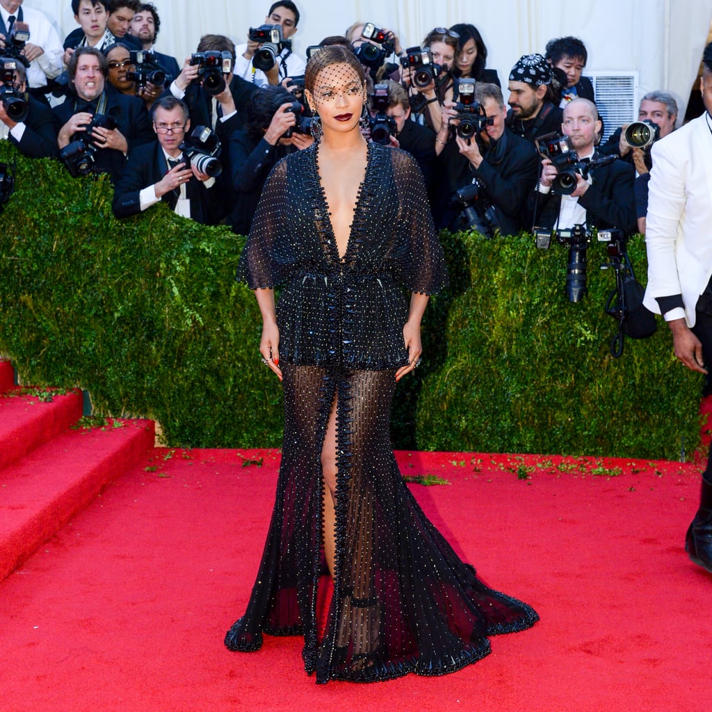 Wearing a black beaded Givenchy dress to the Met Gala in 2014.
