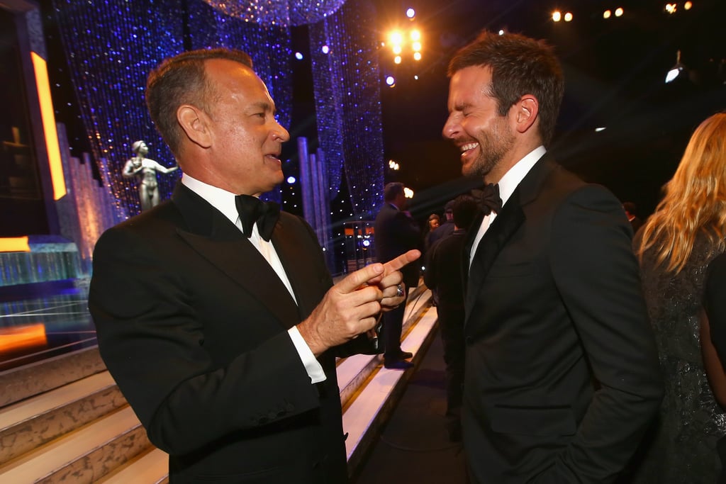 Tom Hanks and Bradley Cooper laughed.