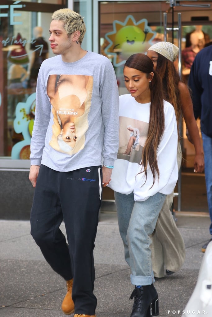 Ariana and Pete adorably matched in her Sweetener merch the day after the VMAs in NYC. Ariana rolled up her Re/Done jeans to reveal Prada combat boots.