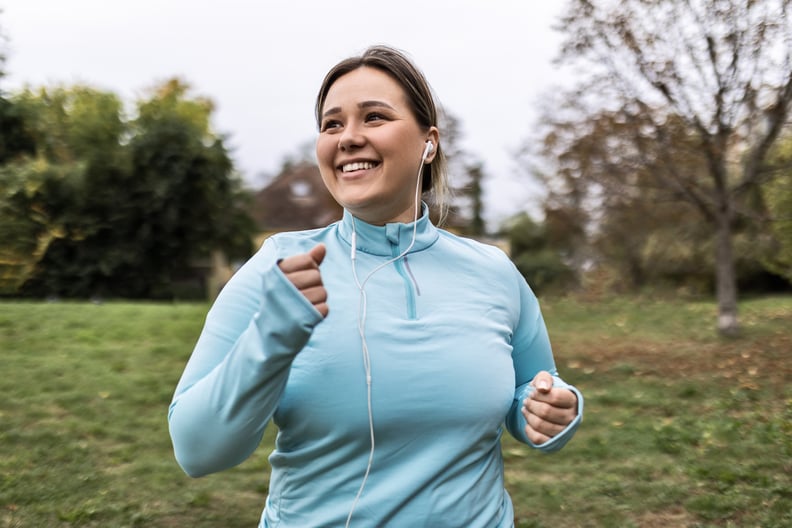 Young woman running and feeling energized.