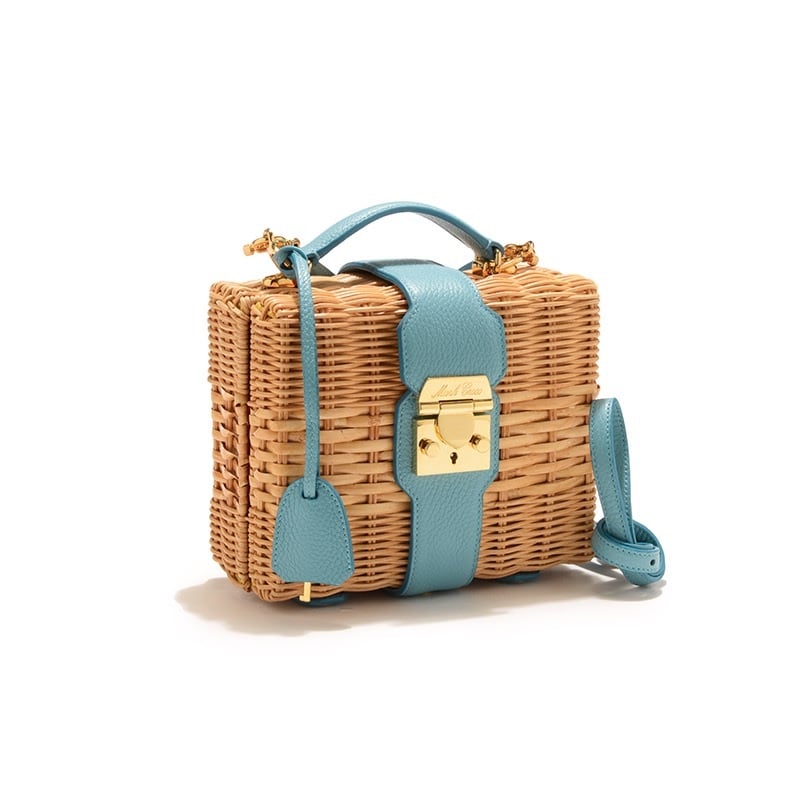 "All I want is a straw bag, and while I could wait until the holidays are over and the sun comes out, I can't pass up on the new Mark Cross x HVN bags ($2,095). Offered in robin egg or coral, these are the perfect shape, and the leather details make them all the more luxe." — SW