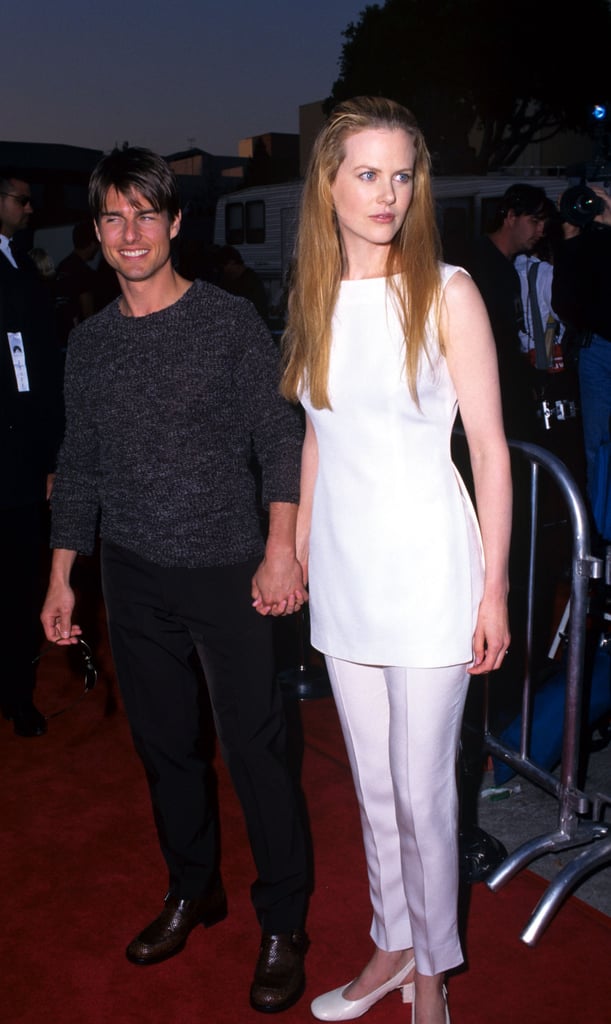 Nicole wearing a crisp white coordinate set at the LA premiere of Mission: Impossible in 1996.