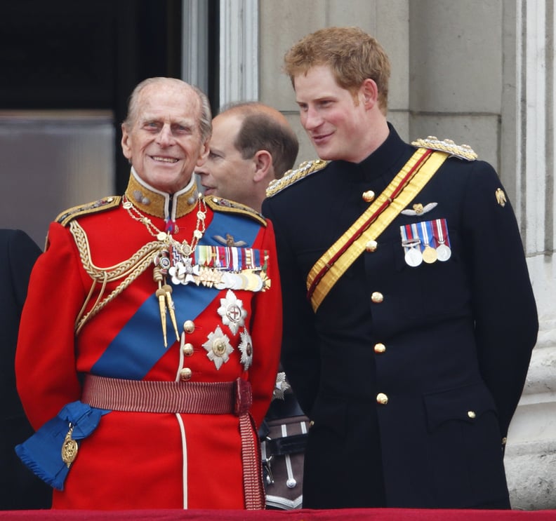 LONDON, UNITED KINGDOM - JUNE 014: (EMBARGOED FOR PUBLICATION IN UK NEWSPAPERS UNTIL 48 HOURS AFTER CREATE DATE AND TIME) Prince Philip, Duke of Edinburgh and Prince Harry watch the fly-past from the balcony of Buckingham Palace during Trooping the Colour