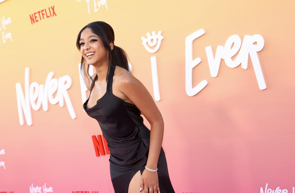 Maitreyi Ramakrishnan celebrated the season three premiere of "Never Have I Ever" on the red carpet with her fellow castmates on Thursday, Aug. 11, in LA. The actor, who stars as Devi Vishwakumar in the Netflix series, wore a black satin gown by Bach Mai for her big night. 
While Ramakrishnan and her stylist, Joseph Cassell Falconer, often gravitate toward colorful pieces, they chose an edgier look this time around that showcased a more mature silhouette, featuring a halter neckline, draped detailing, and a thigh-high leg slit. Ramakrishnan's ensemble was complete with classic black ankle-strap sandals and a silver bracelet. She rocked a dark smoky eye, messy ponytail, and black french manicure to match. 
Emerging American couturier Bach Mai has also dressed the likes of Venus Williams and Tessa Thompson. At the "King Richard" premiere last November, Williams wore a silver metallic version of Ramakrishnan's dress. That same month at the Gotham Awards, Thompson donned a Victorian-inspired strapless ball gown by the designer, which she paired with leather opera gloves.  
Since entering the scene just a few years ago with her breakout "Never Have I Ever" role, Ramakrishnan has already impressed with her playful style at events. For the 19th annual Unforgettable Gala in December 2021, she wore an intricate rainbow dress made from upcycled sarees by Indian designer Ashwin Thiyagarajan. More recently, the actor has continued to show off vibrant pieces while promoting the latest season of "Never Have I Ever," which dropped on Netflix Aug. 12. For a "Tonight Show" appearance on Aug. 9, she wore a whimsical Zimmermann minidress covered in purple, pink, and blue florals.
Ahead, see more photos of Ramakrishnan's look for the grand finale of her press tour.

    Related:

            
            
                                    
                            

            The Big Difference in Devi&apos;s Style in "Never Have I Ever" Season 3