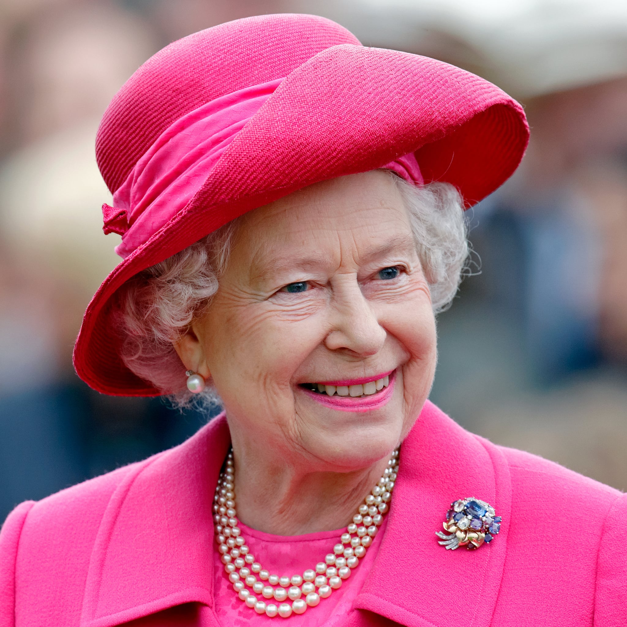 A look at the Queen's incredible designer scarf collection