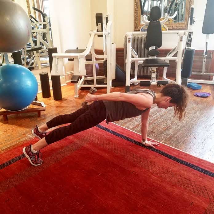 Why it’s effective: “This is an amazing combination exercise that engages, strengthens, and tones your core, while the dumbbell row to triceps extensions helps shape, tone, and sculpt your back and triceps.”