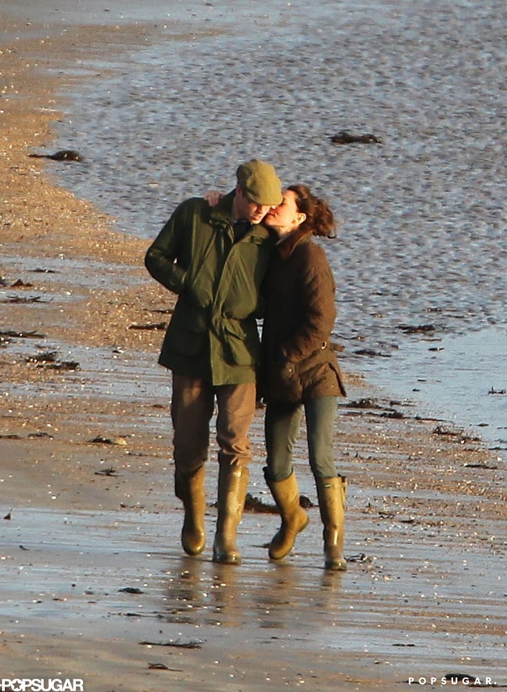 William and Kate cozied up during a January walk by the water in Wales in 2012.