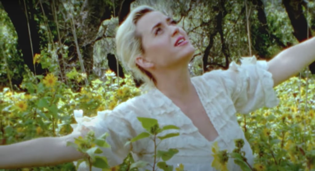 See Katy Perry's White Lace Dresses in "Daisies" Music Video